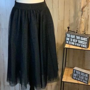 Signature Collection triple layer mesh skirt.